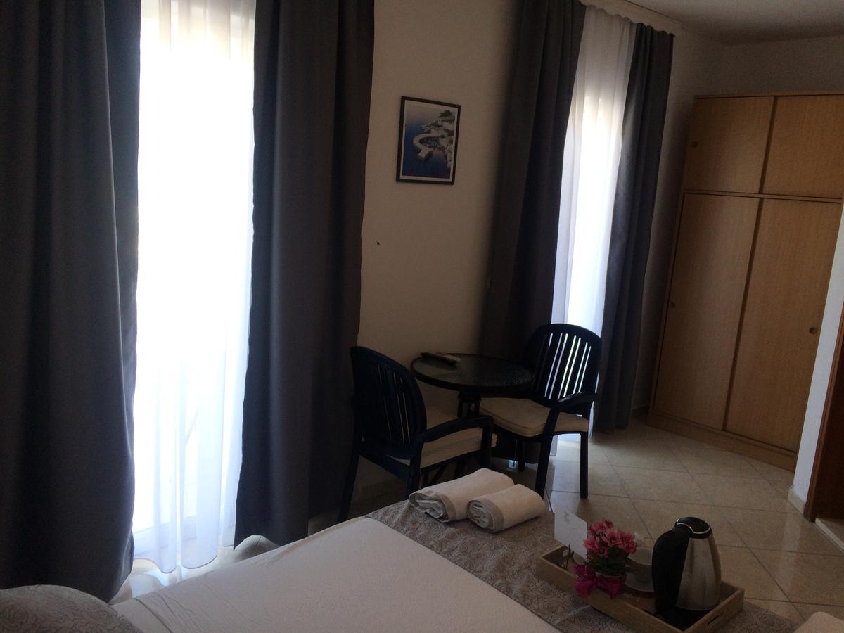 Villa Menalo Hodilje Habitación foto